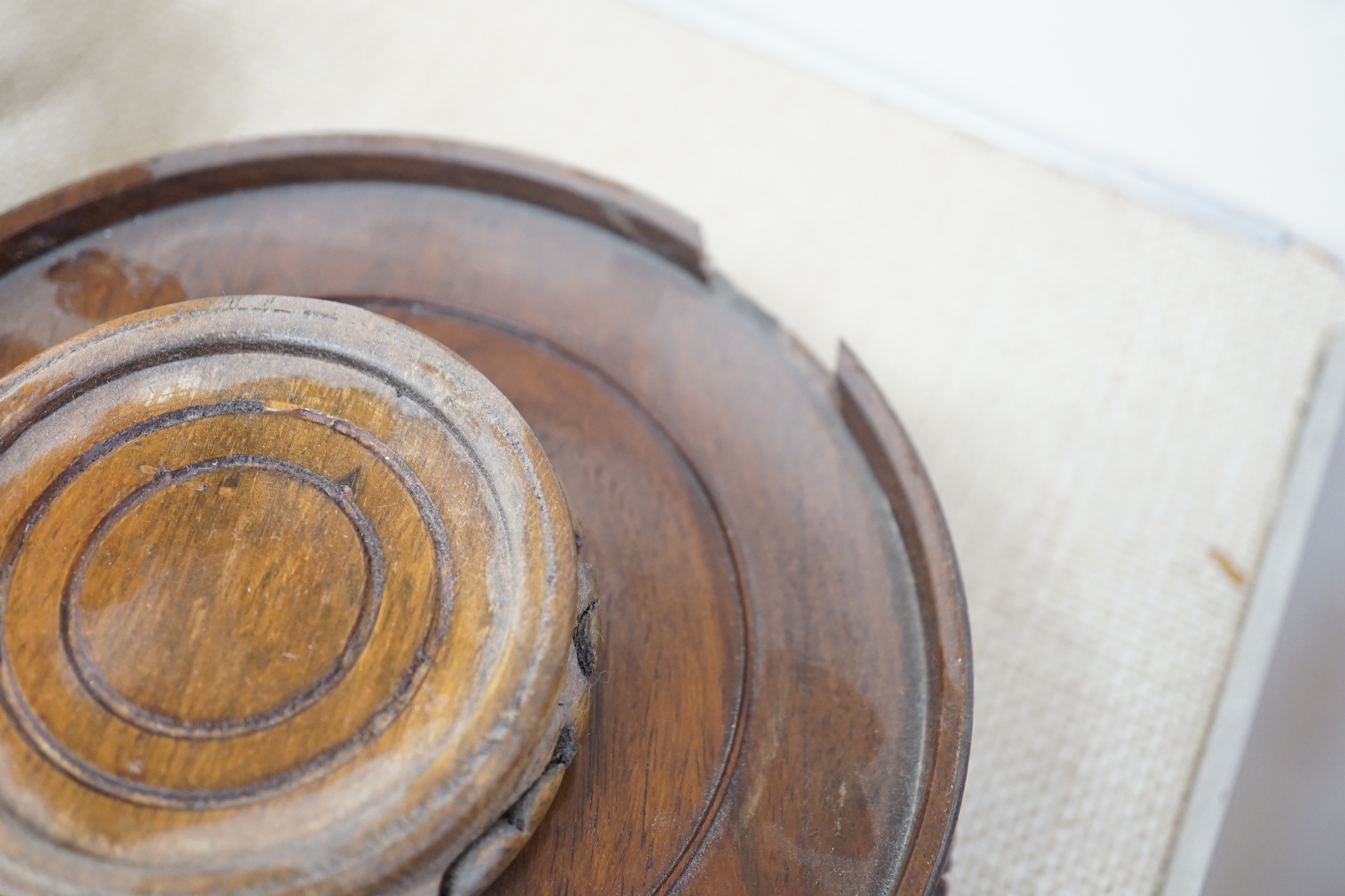 Seventeen Chinese carved wood stands of varying sizes, largest 30cm diameter